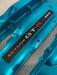 Blue Nissan Skyline GT-R engine cover on a gray background
