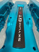 Blue engine cover with 'SKYLINE GT-R' branding on a gray background